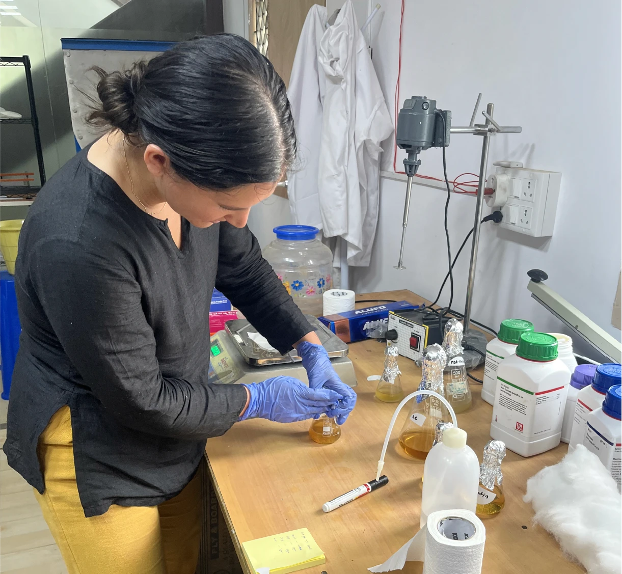 Priyanka K. Naithani working in a lab