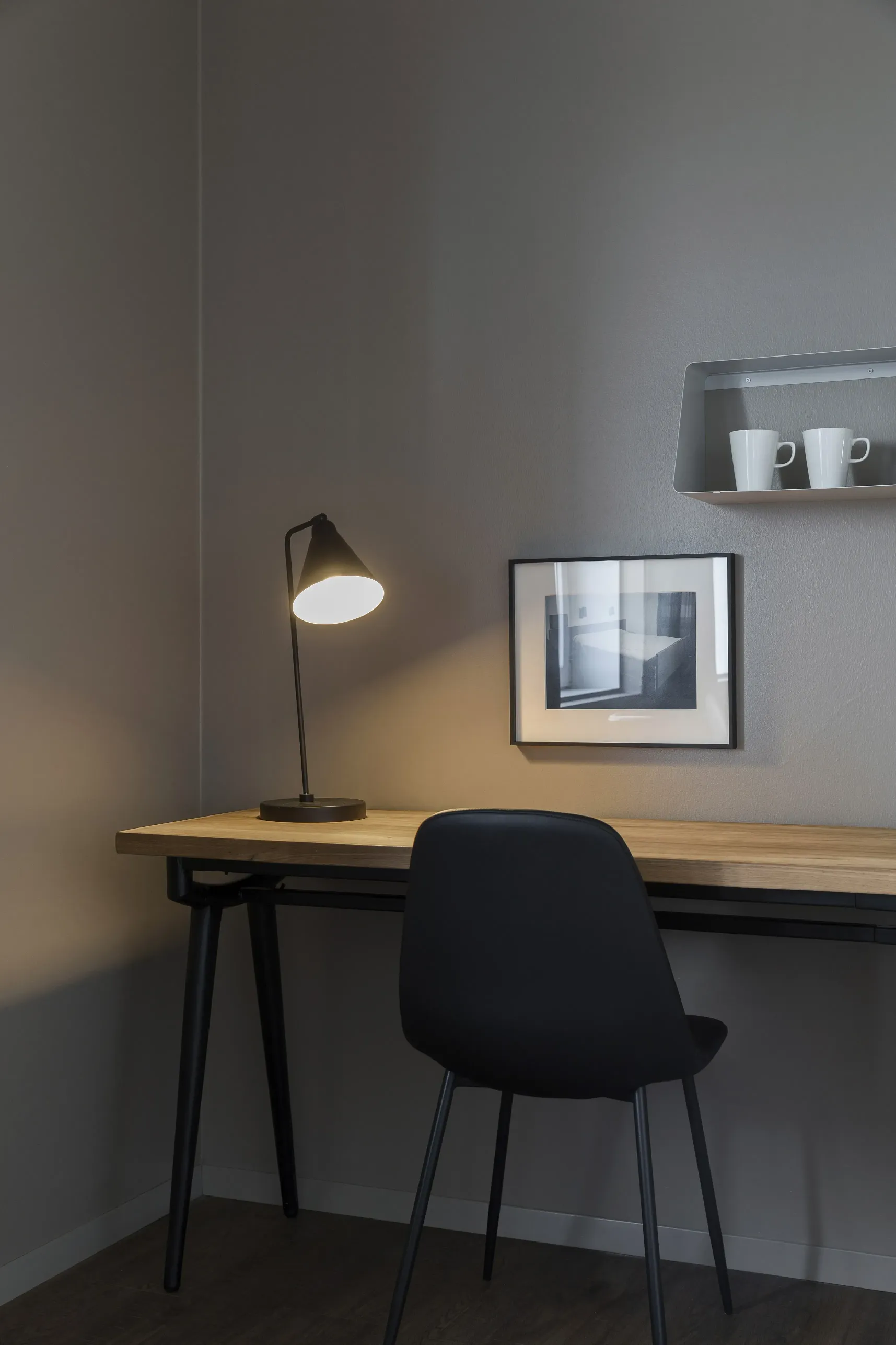 small desk with little lamp