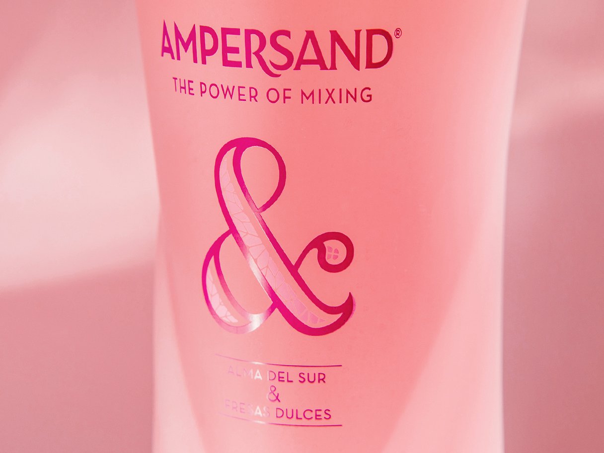 Rooftops of a coastal town with the sea in background