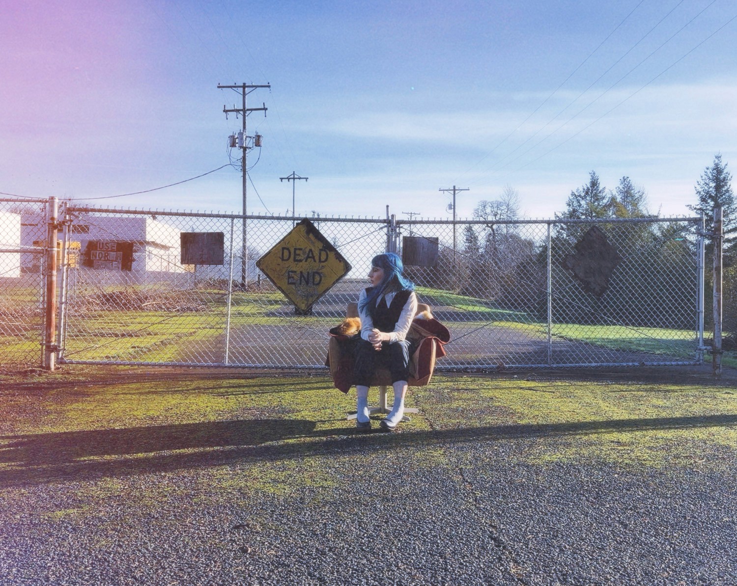 Performer under spotlight on dark stage