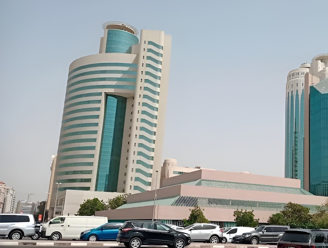 Wide exterior view of Al Reem Tower from the road, emphasizing its prominence in the local property market.