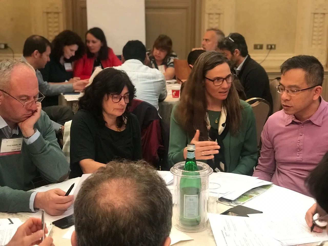 Participants working through cases at an EQuIP workshop