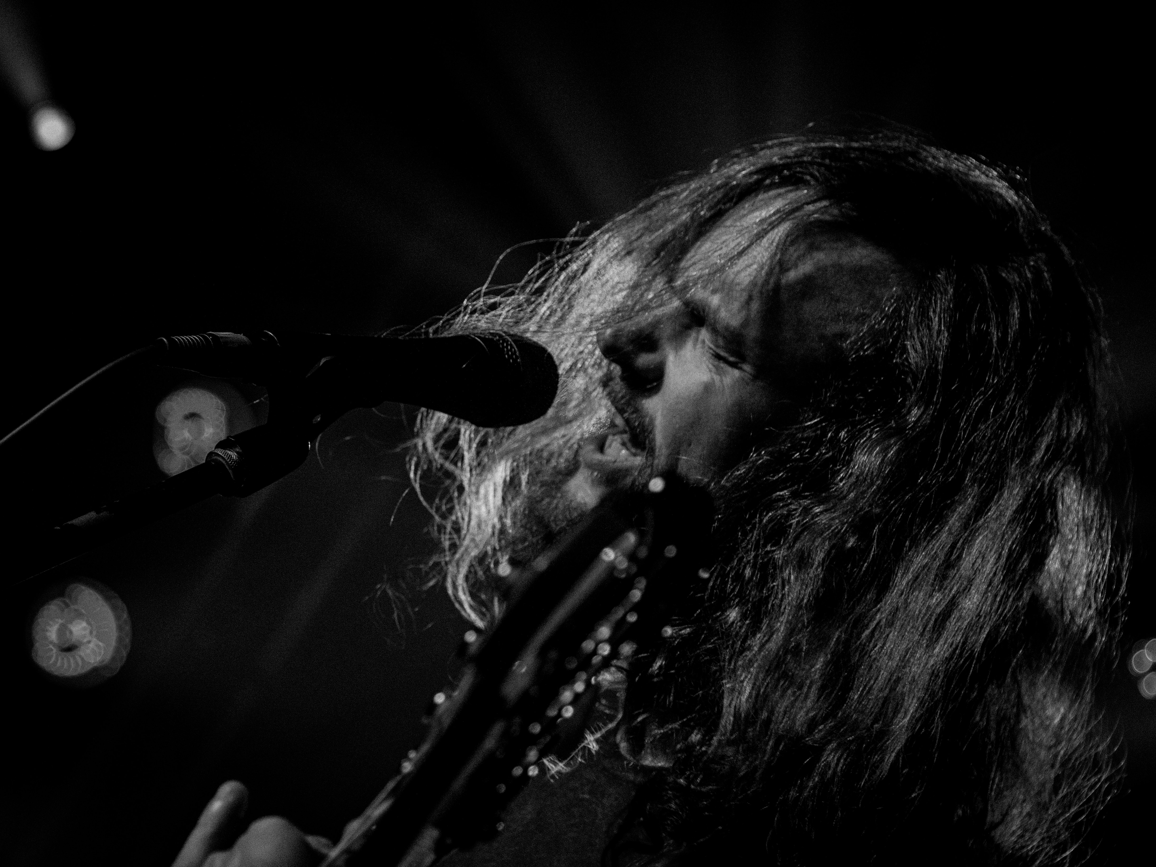 Long haired singer on mic - different voice types