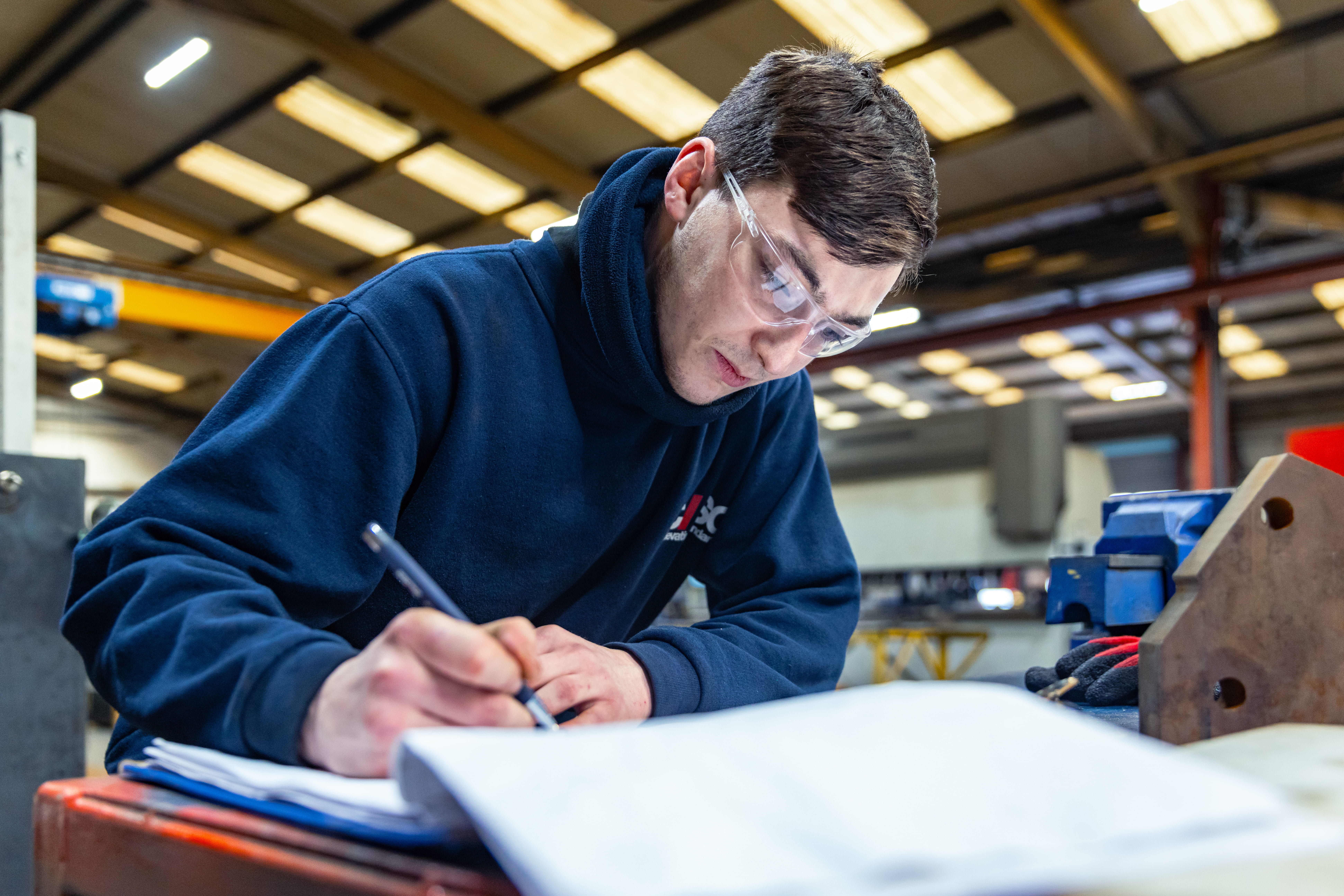 CASC team member studying notes