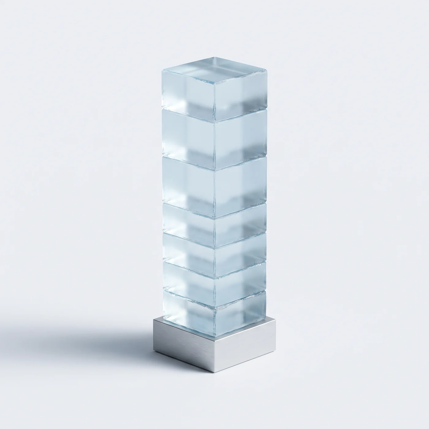 Tower of stacked glass blocks on a steel base, representing corporate tax