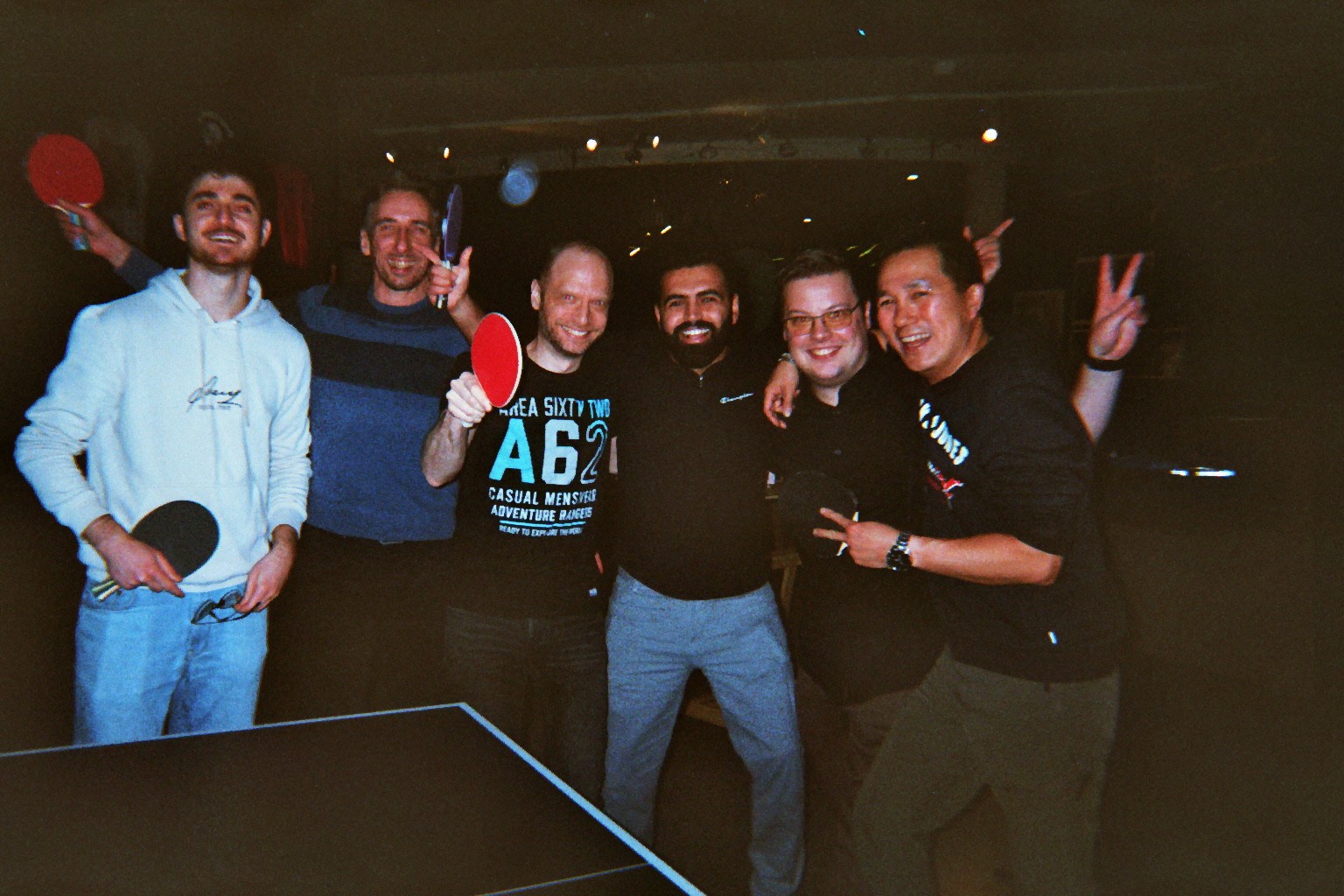 a ping pong paddle and a ping pong ball