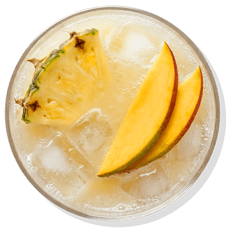 A glass of iced seltzer garnished with mango slices.