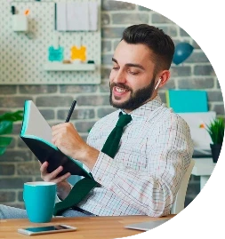 man writting in his journal