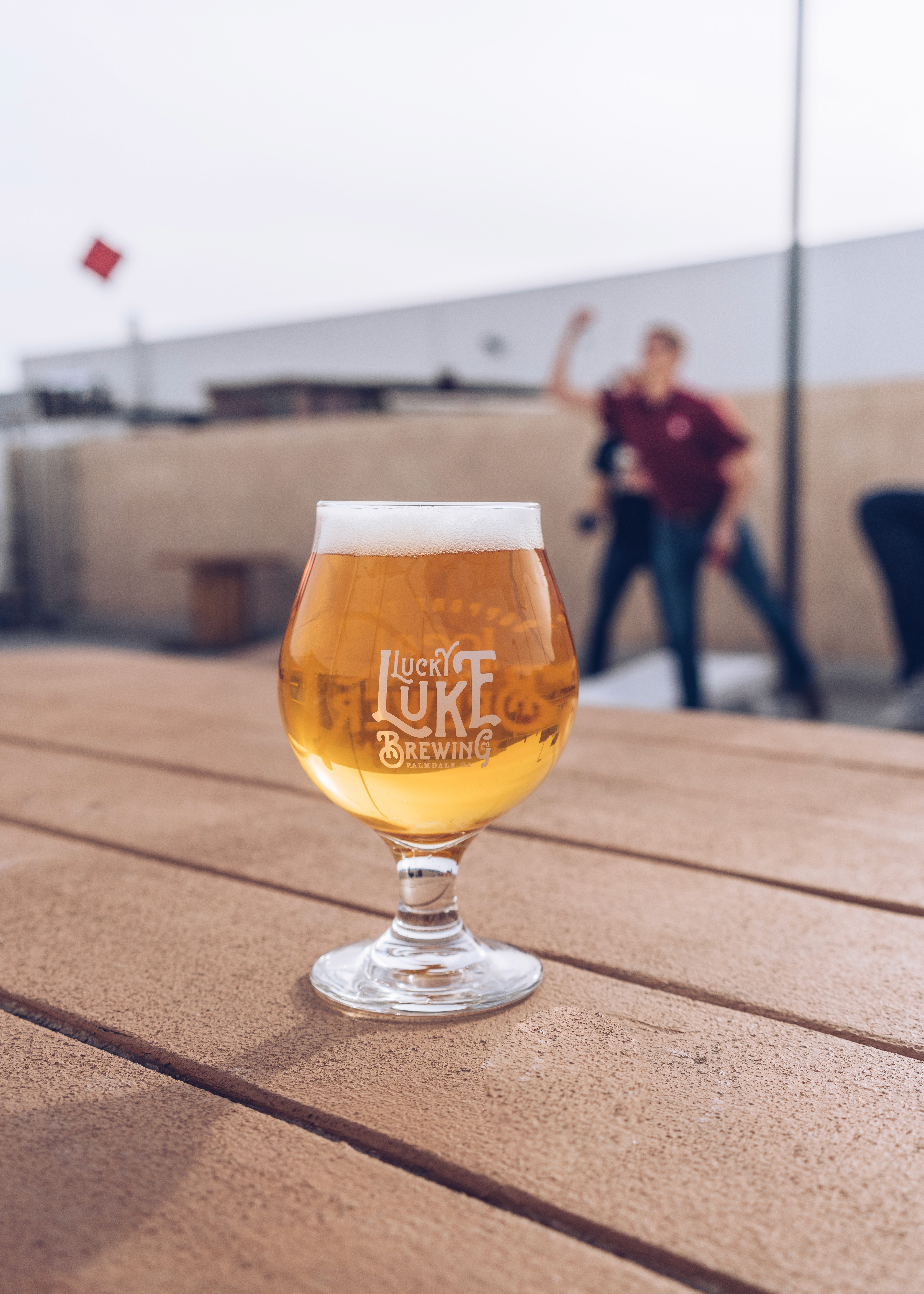 Lucky Luke beer glass on outdoor table