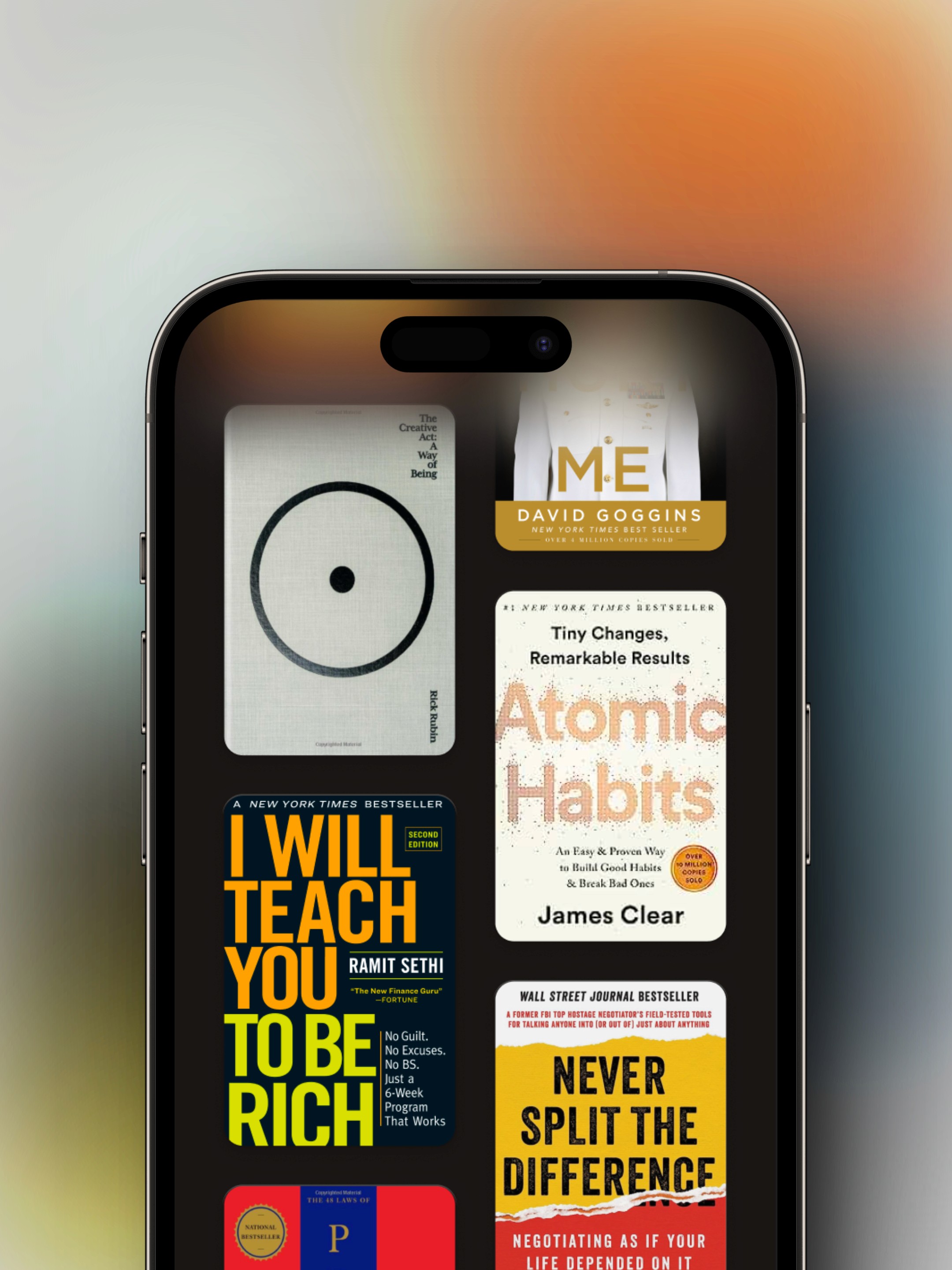 An iPhone displaying an app containing book covers