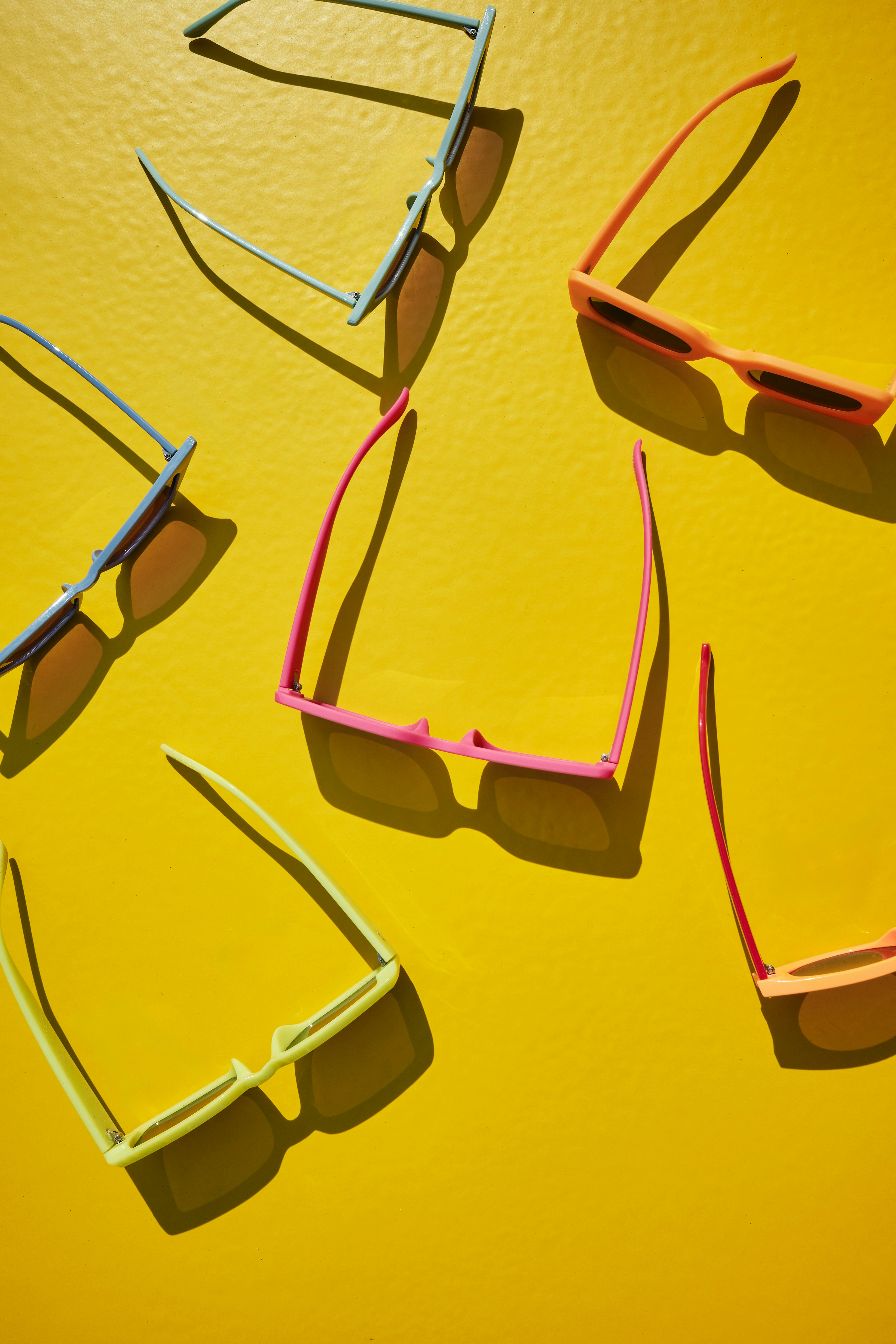 Sunglasses on yellow background