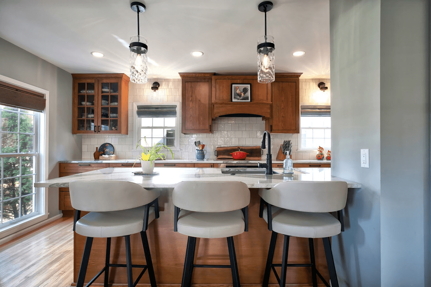 grayscale photo of person using MacBook