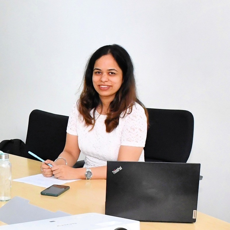 woman in white and blue checked dress shirt