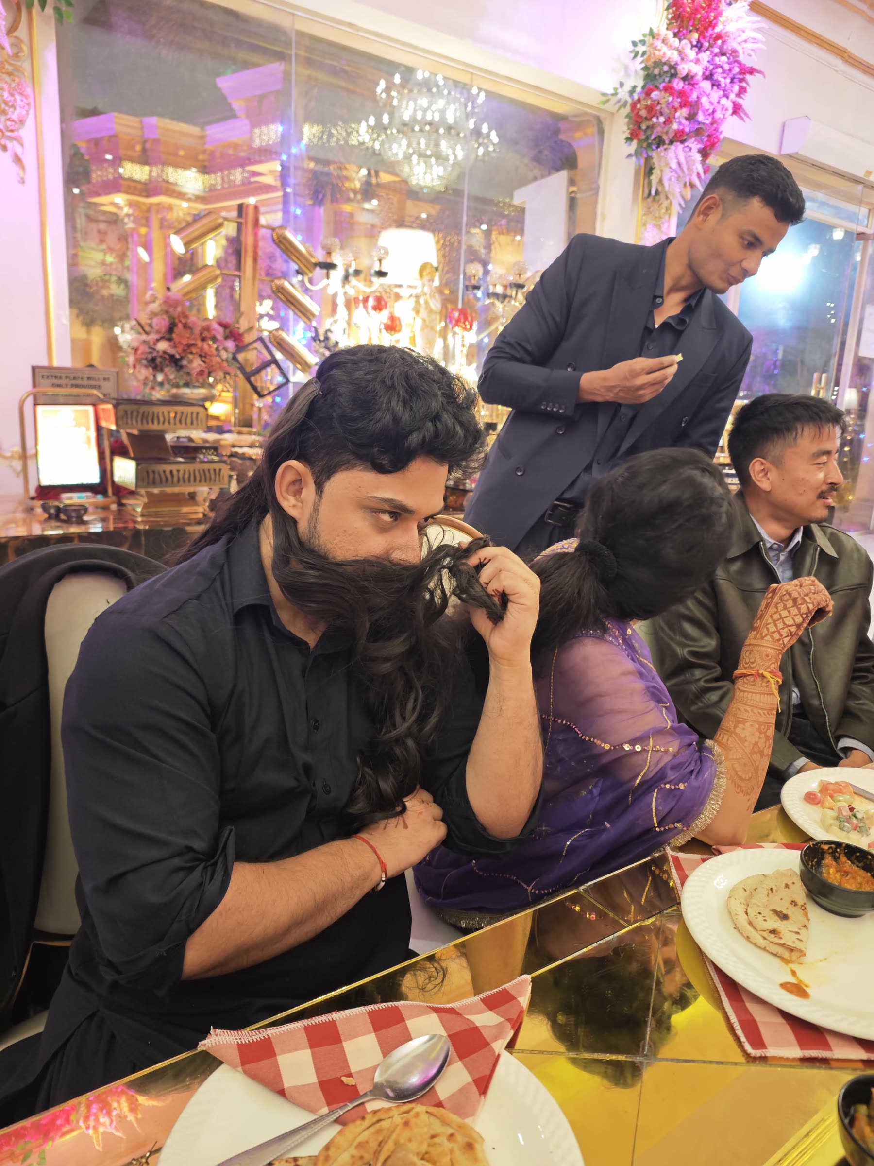 A candid wedding table moment