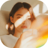 Young woman using a smartphone with warm golden hour lighting