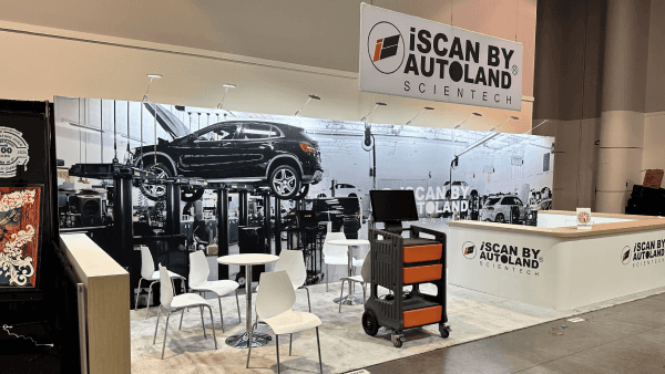A branded booth composition that supports the main display with cleaner graphic hierarchy, product grouping, and stronger aisle readability.