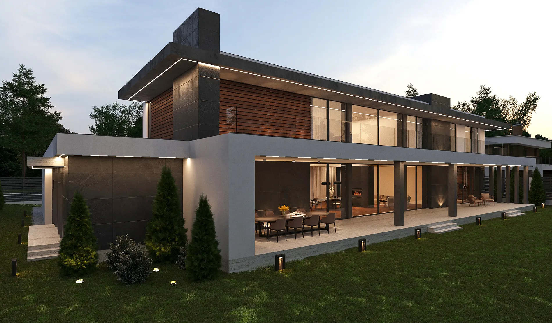 Wide shot of a contemporary minimalist villa with large glass windows and an illuminated interior at dusk.