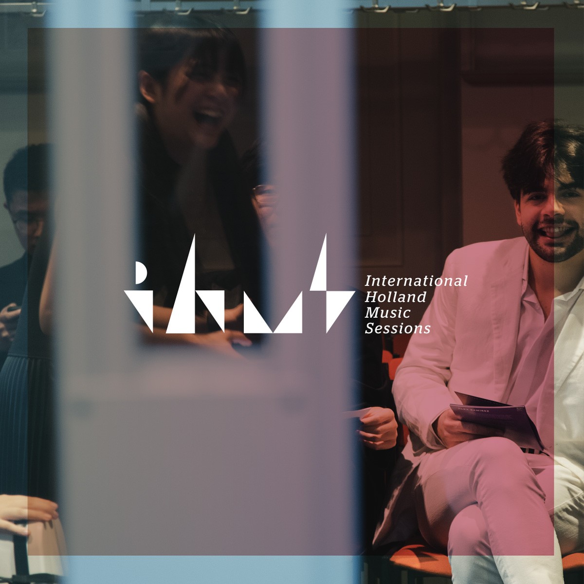 White logo for IHMS on pink backgroudn