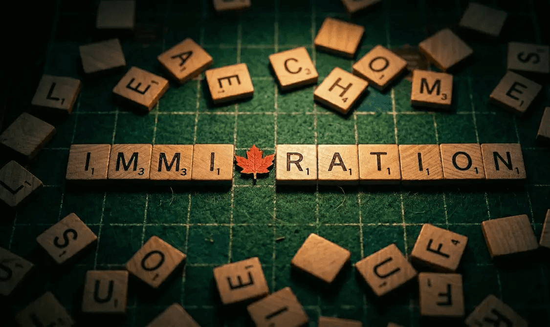 A close up of a scribble tiles spelling a word "immigration".