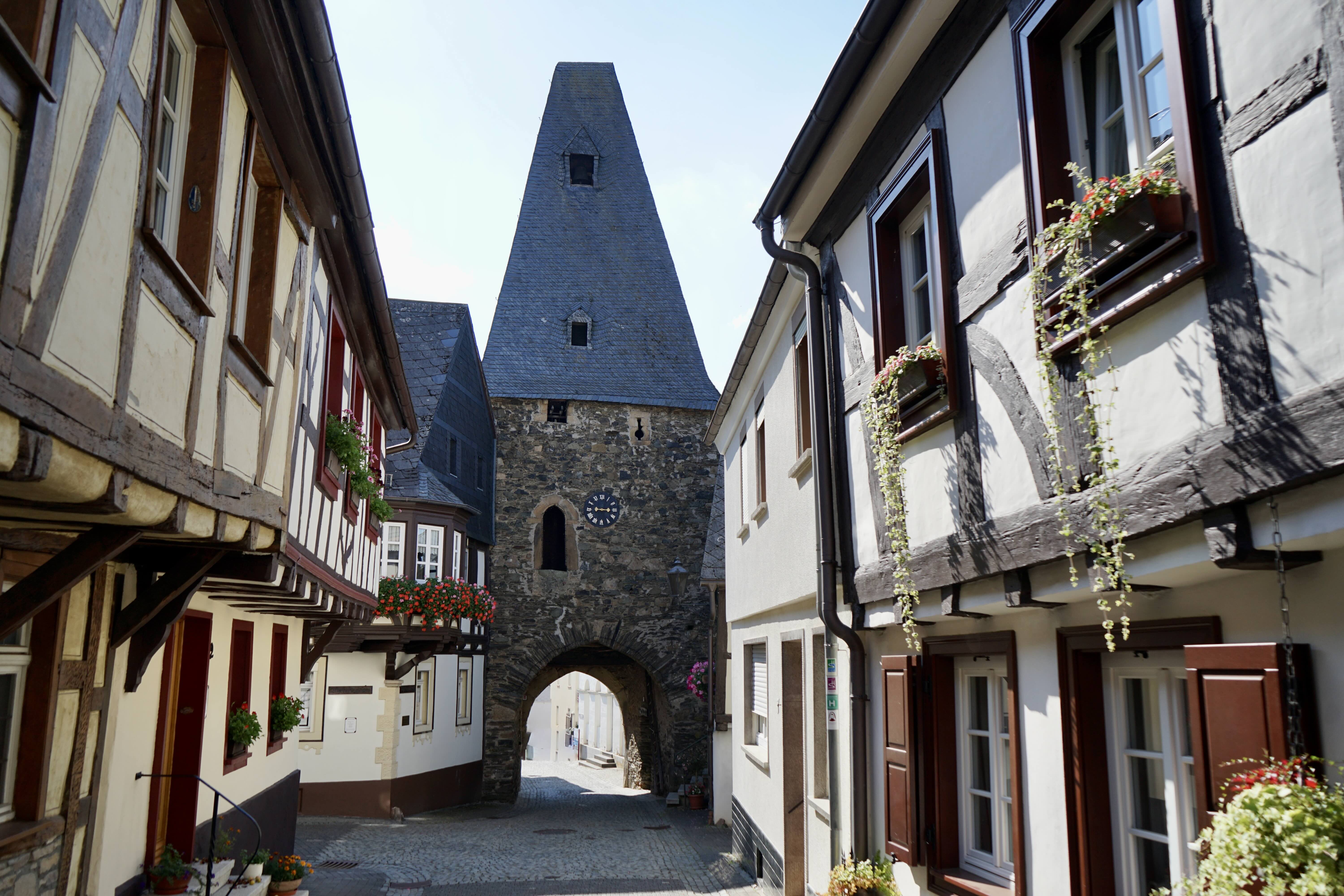 Clock tower of Herrstein with half-timbered houses