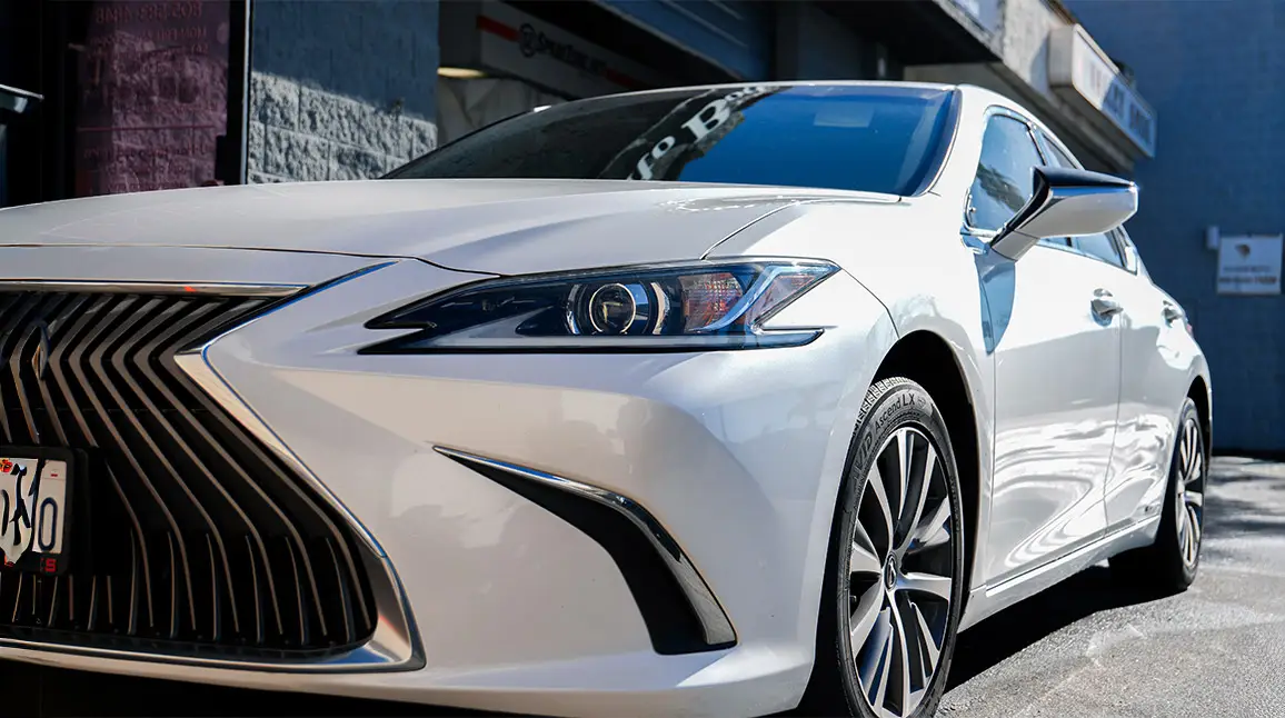 Lexus sedan after professional collision repair at Auto Body Unlimited.