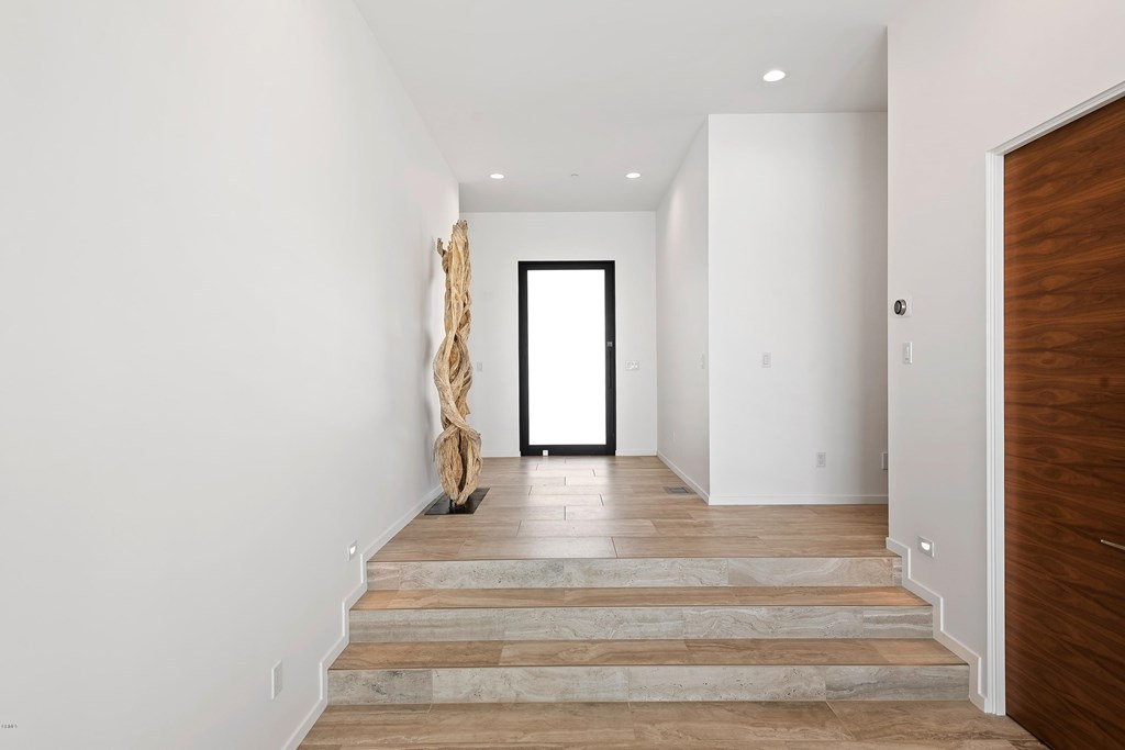 Entryway of the modern home, showcasing clean lines and sleek design.