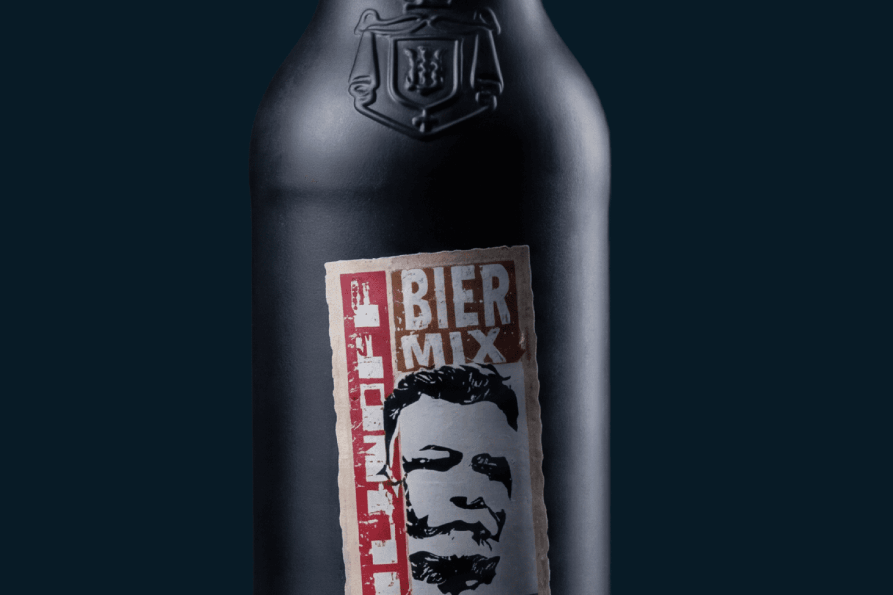 Black bottle with a "BIER MIX" label and portrait
