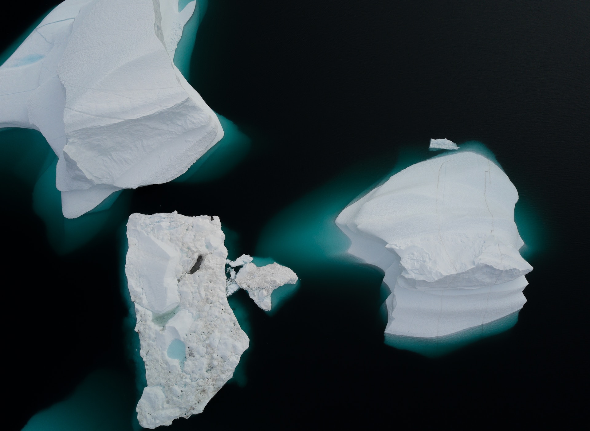 An aerial view of a broken iceberg