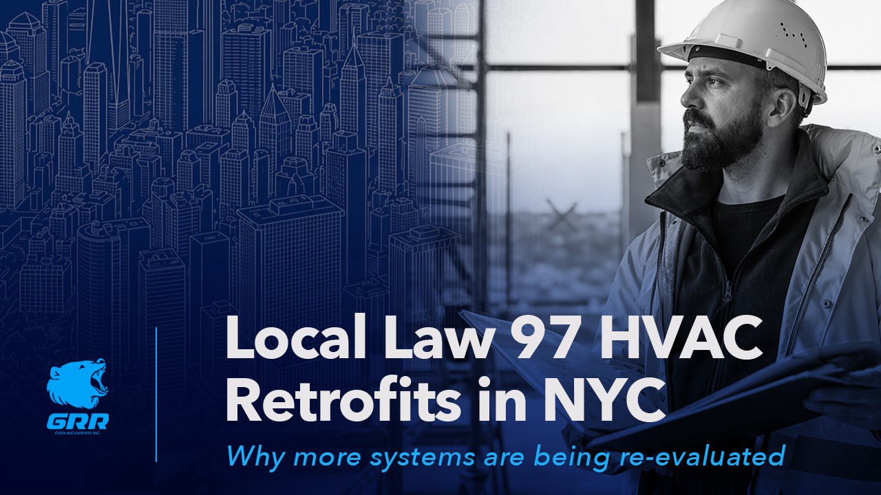 Local Law 97 HVAC retrofits in NYC hero image with engineer reviewing building systems and city skyline background