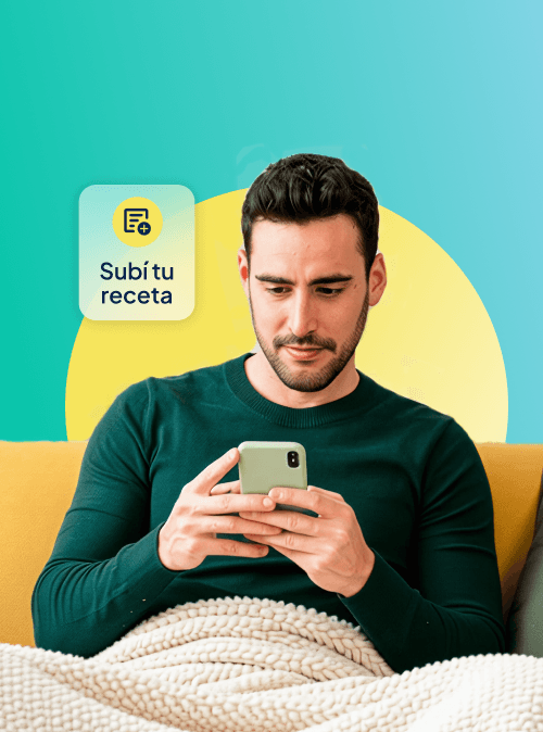 Close-up of a dark green leaf showing its textured surface and central vein against a muted background.