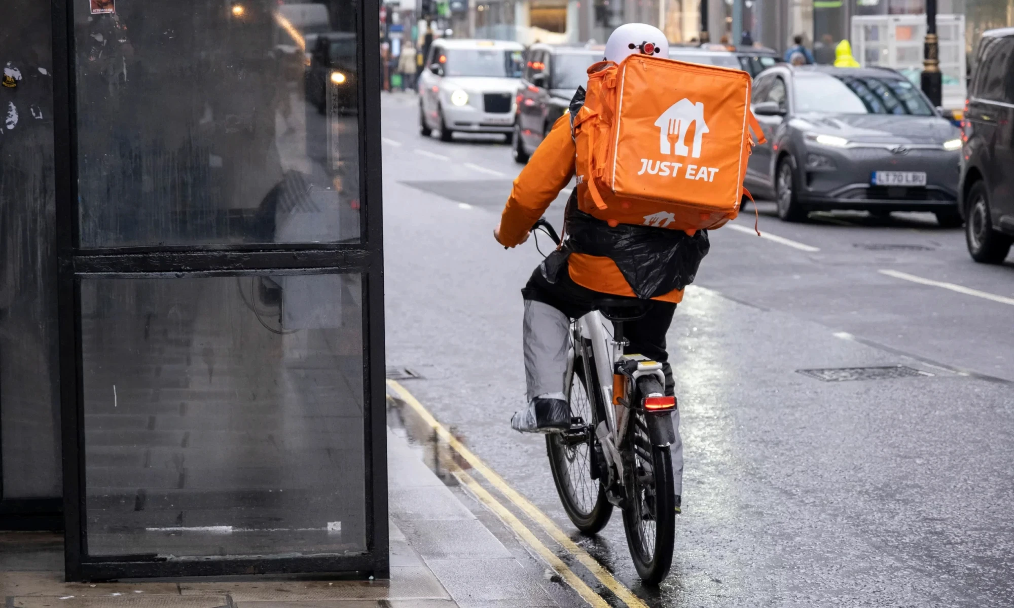 Delivery rider on bicycle