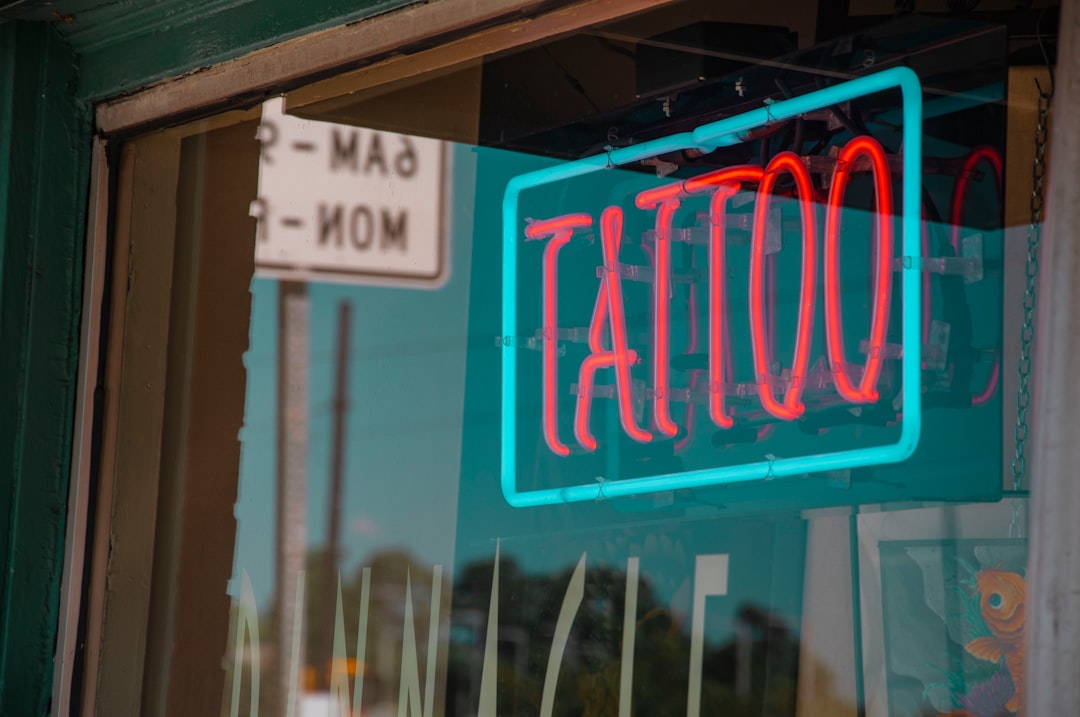 person doing tattoo