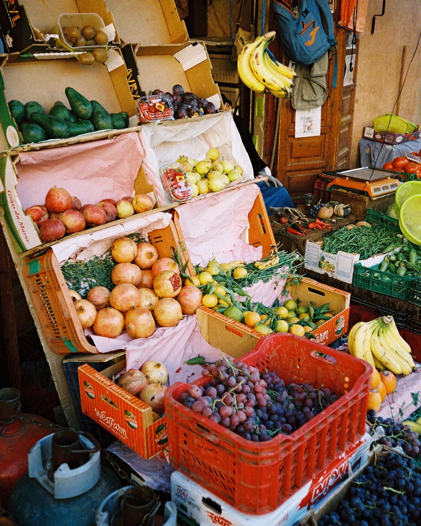 Analog photo of fruits at a market in Morocco.