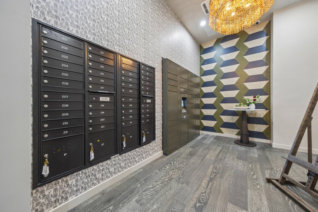 Secure mailroom with mailboxes and parcel lockers