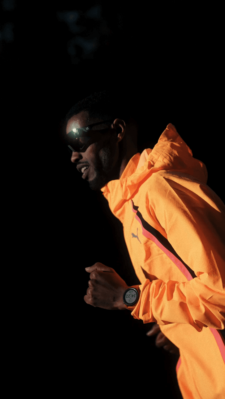 Couple embracing on street, bride's face obscured