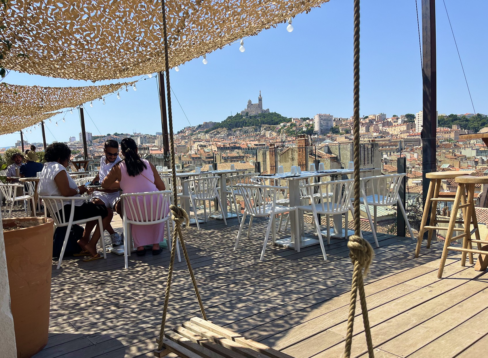 Rooftop terrace view over Marseille with Notre-Dame de la Garde, under an hour from Villa Mauricette in the Var