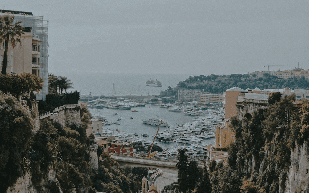a wooden dock sitting next to a large body of water