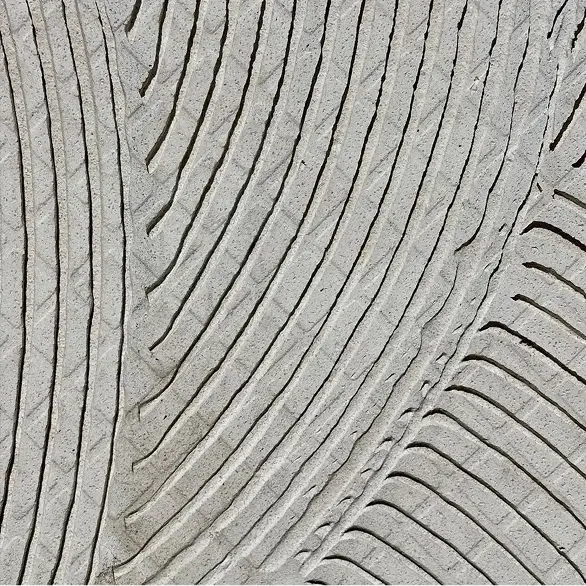 Back of a tile with a fingerprint-like pattern