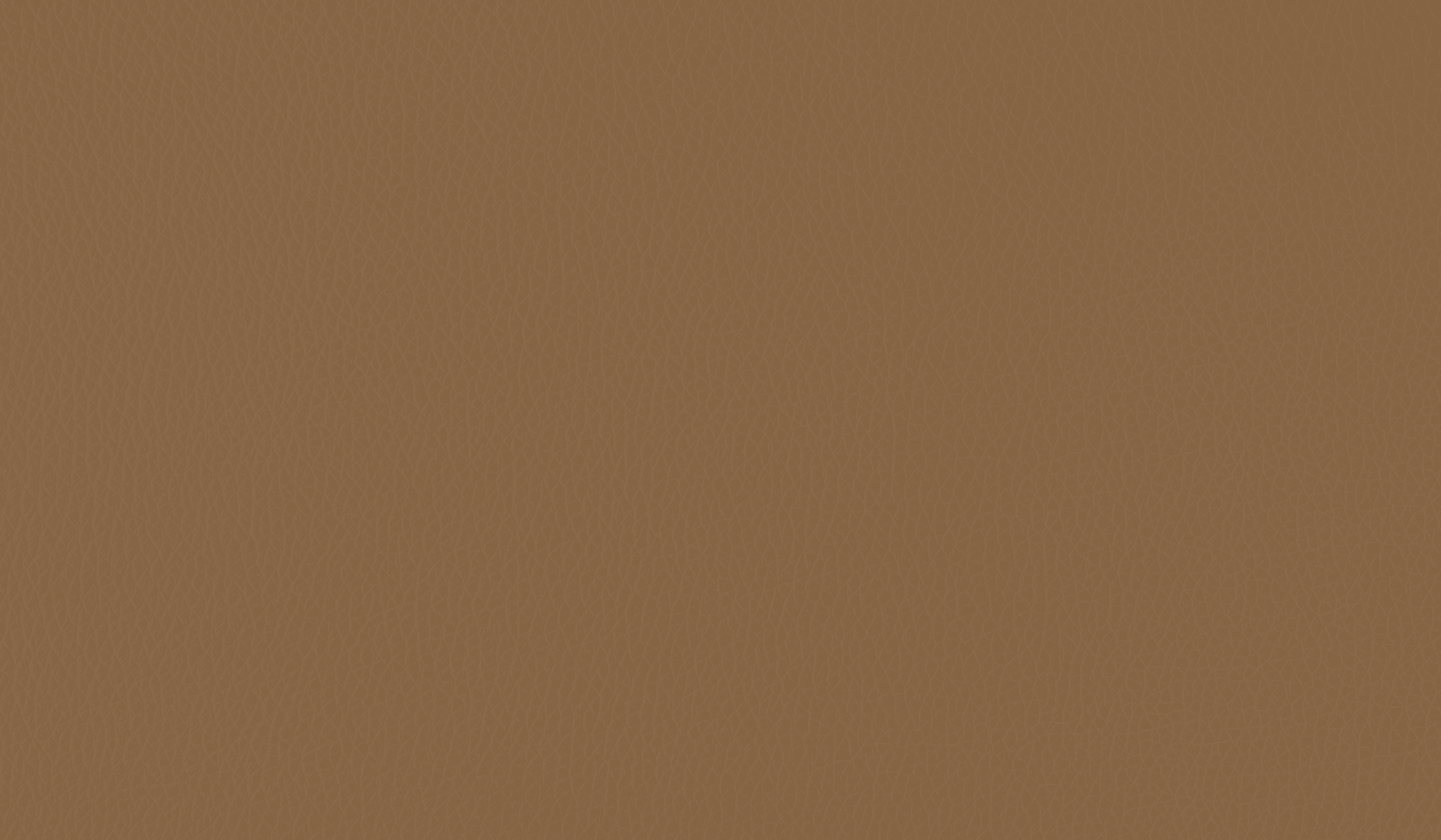 a couple of bottles sitting on top of a wooden table