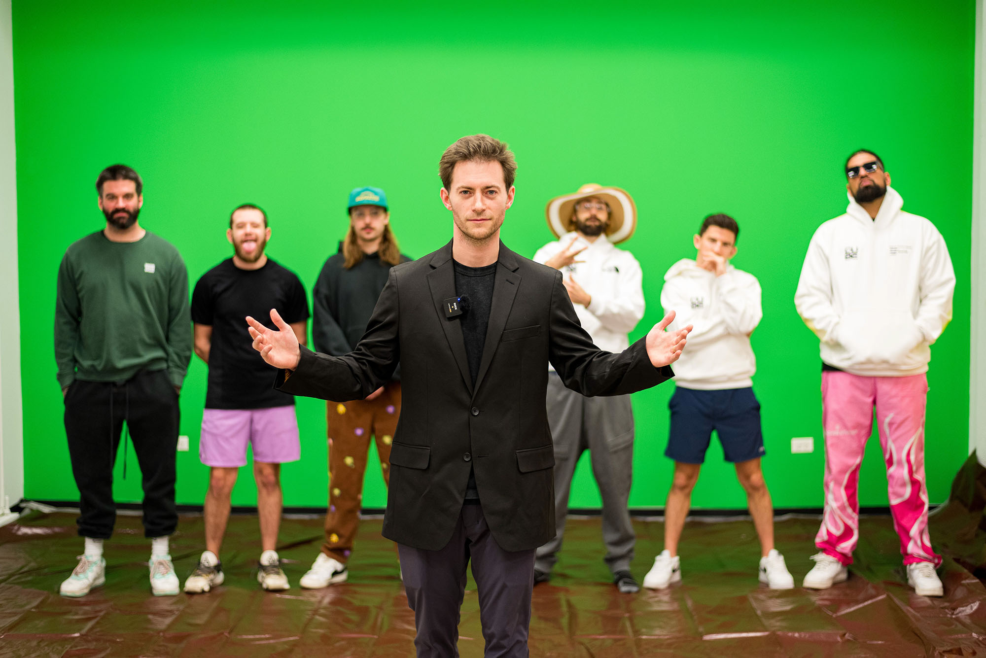 Cube’s creative team during a Chicago green screen studio session, blending style, confidence, and collaboration in a dynamic shoot.