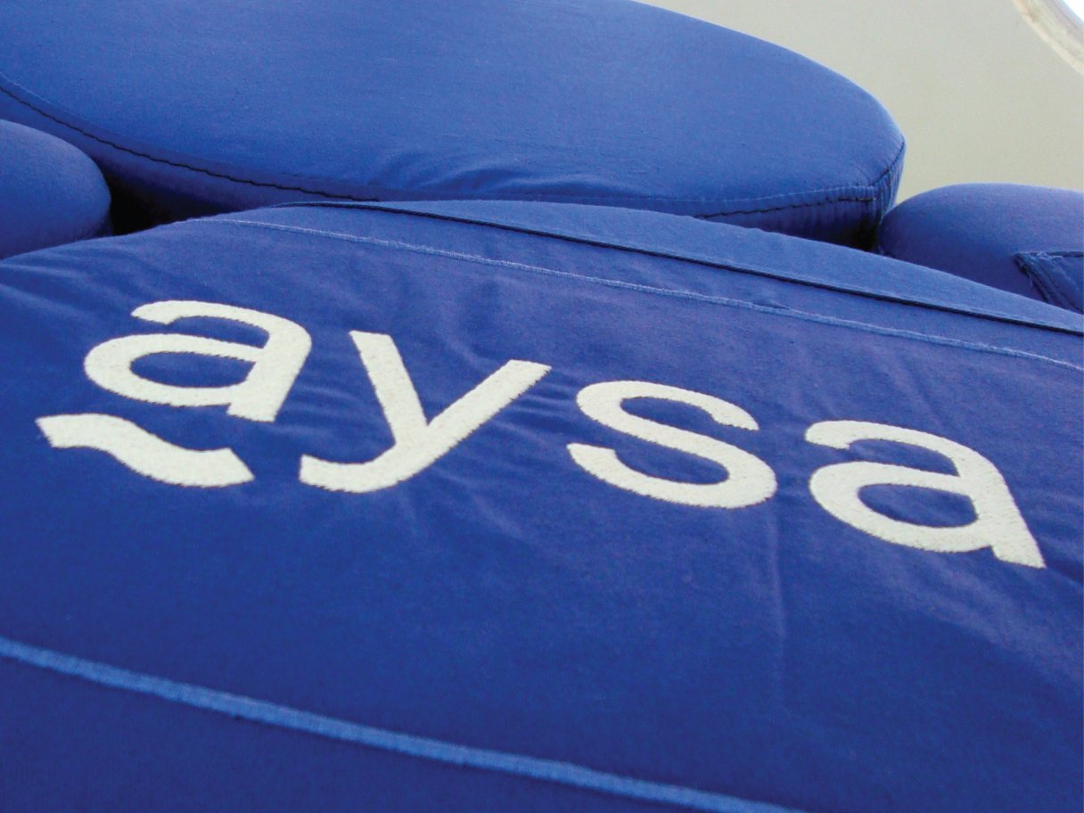 Rustic cabin in a golden field at sunset