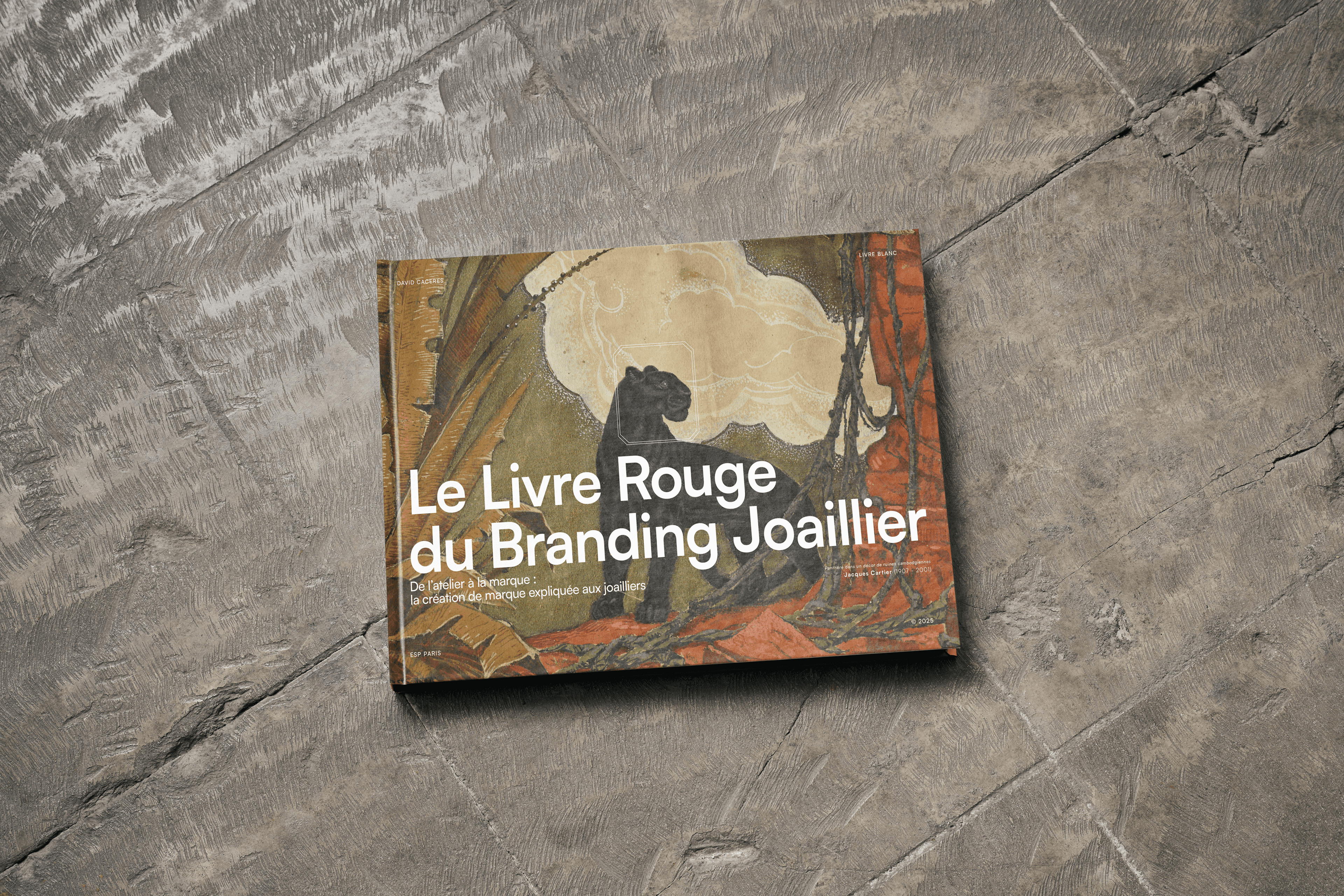 White branded cap with turquoise logo placed on fresh lemons in a red bowl