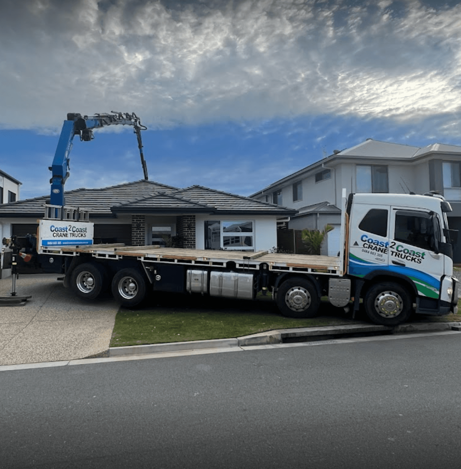 Crane truck lifting a spa