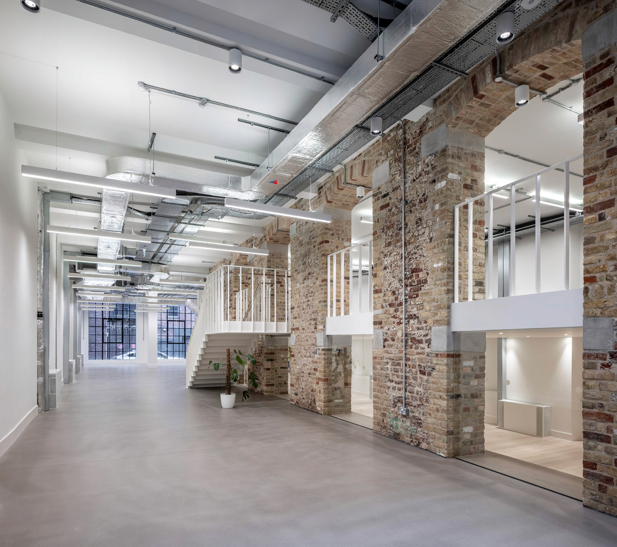 Refurbished brick façade and windows at Curtain House in Shoreditch
