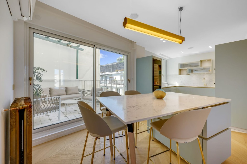 black flat screen tv on white wooden tv rack