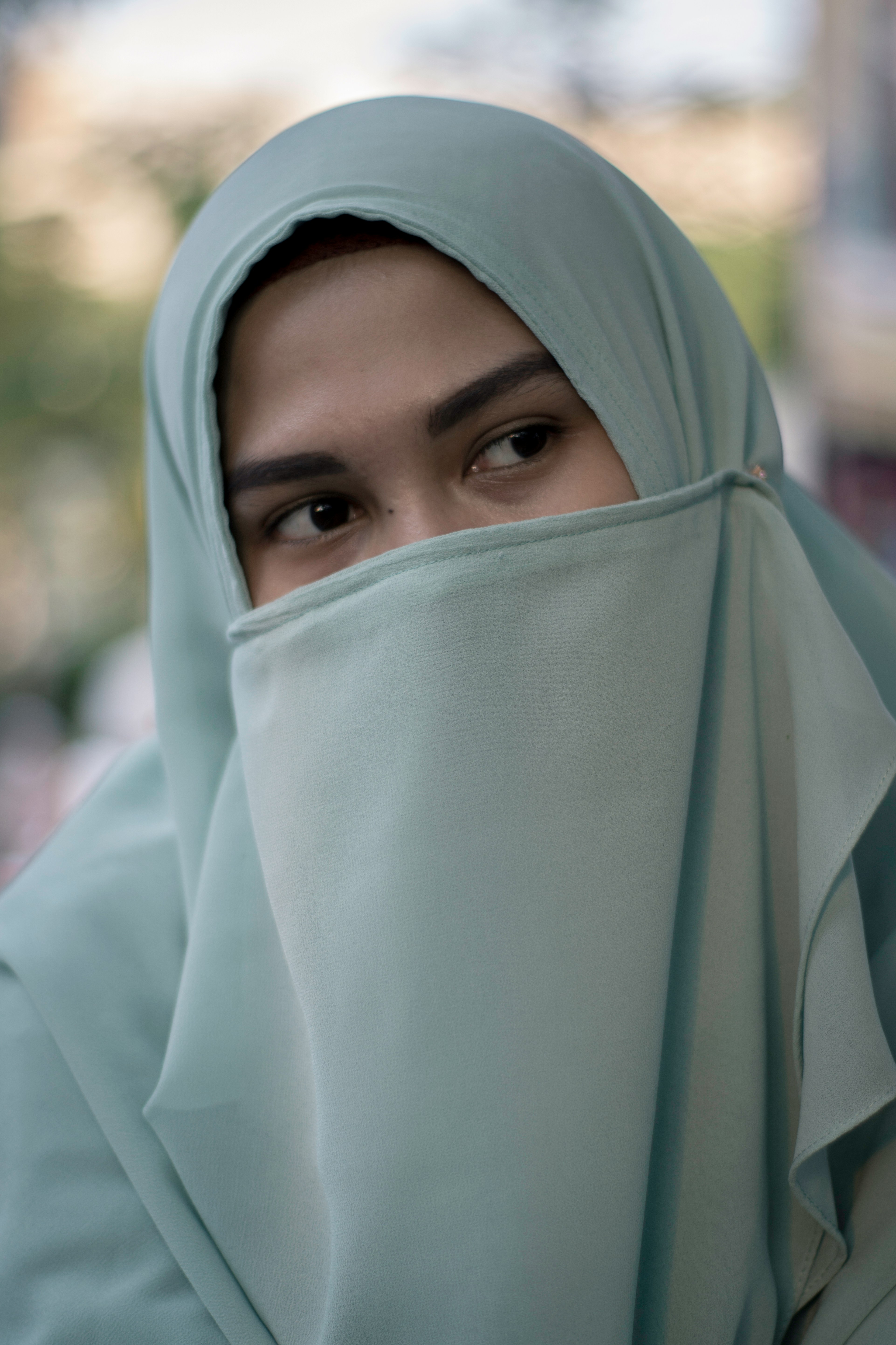 woman wearing blue hijab scarf