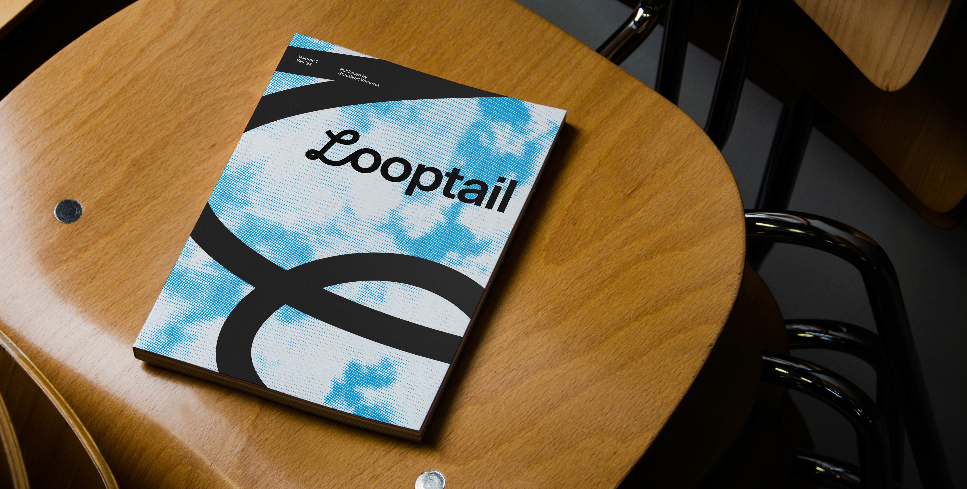 Looptail magazine placed on a chair