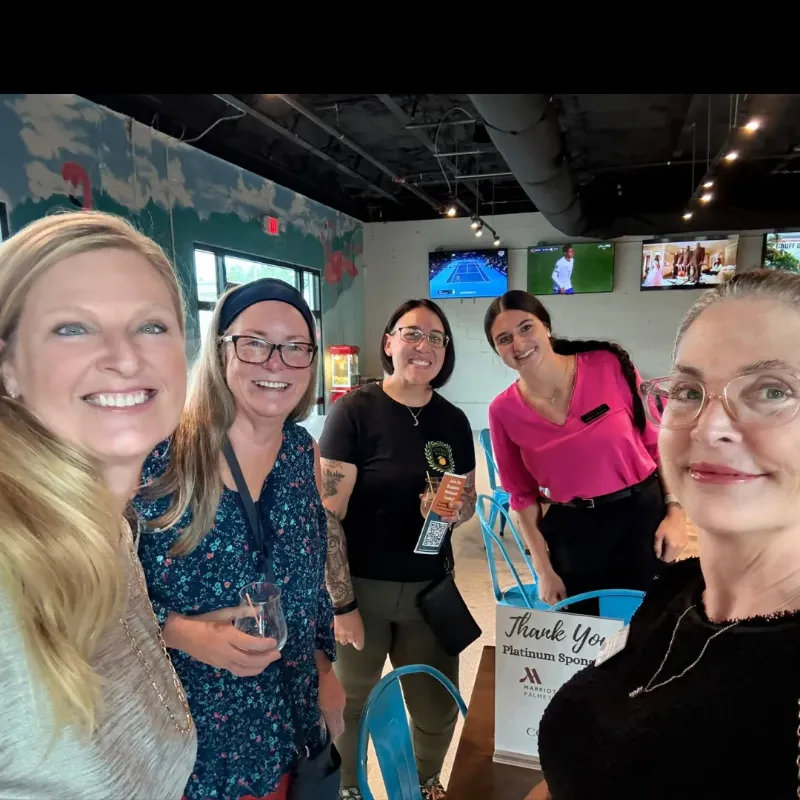 5 people standing in restaurant bradenton
