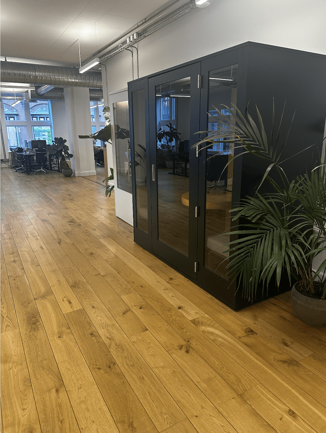 Close-up of a matte black and red modern bike frame with minimalist design