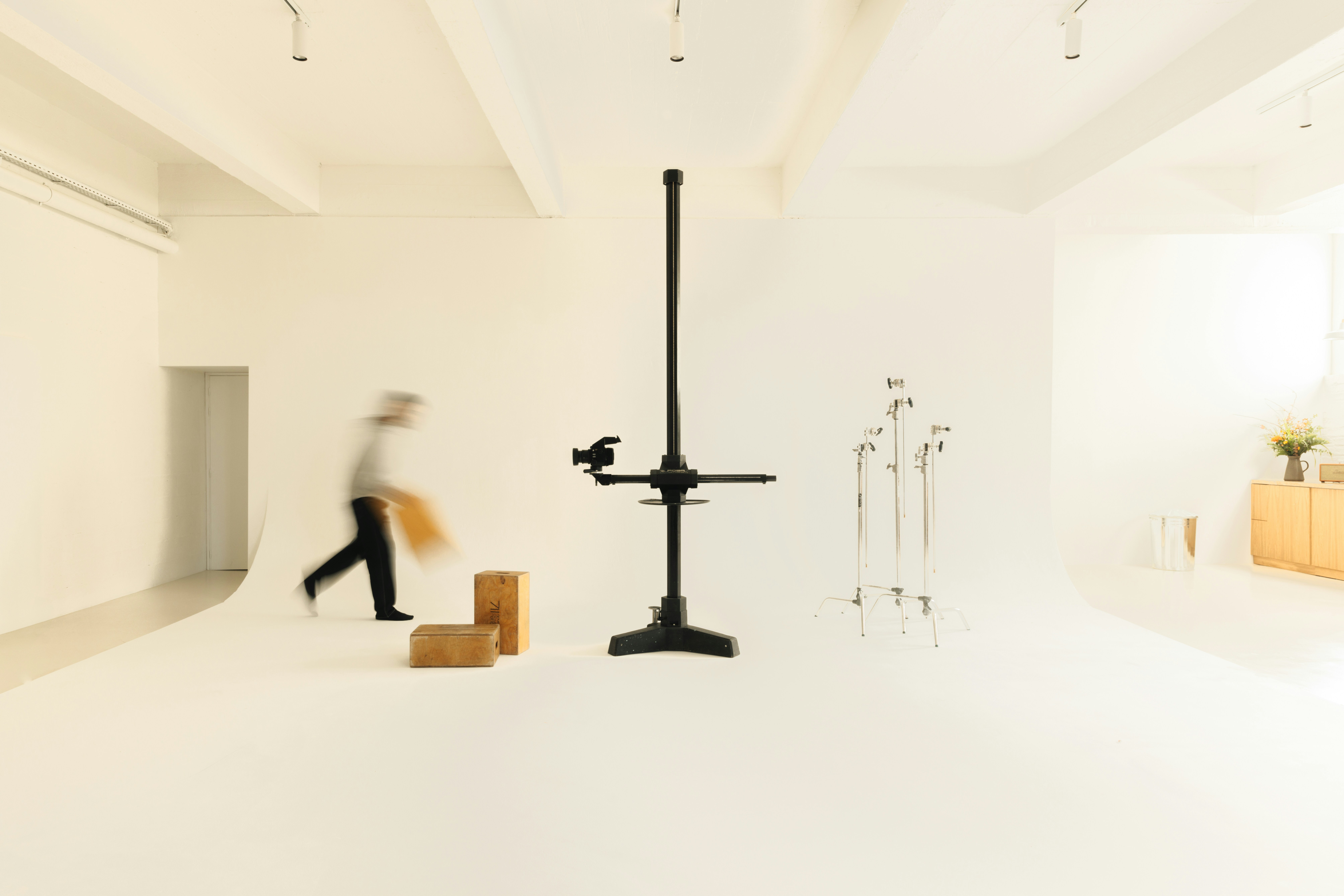 A blurry photo of a person walking in a room